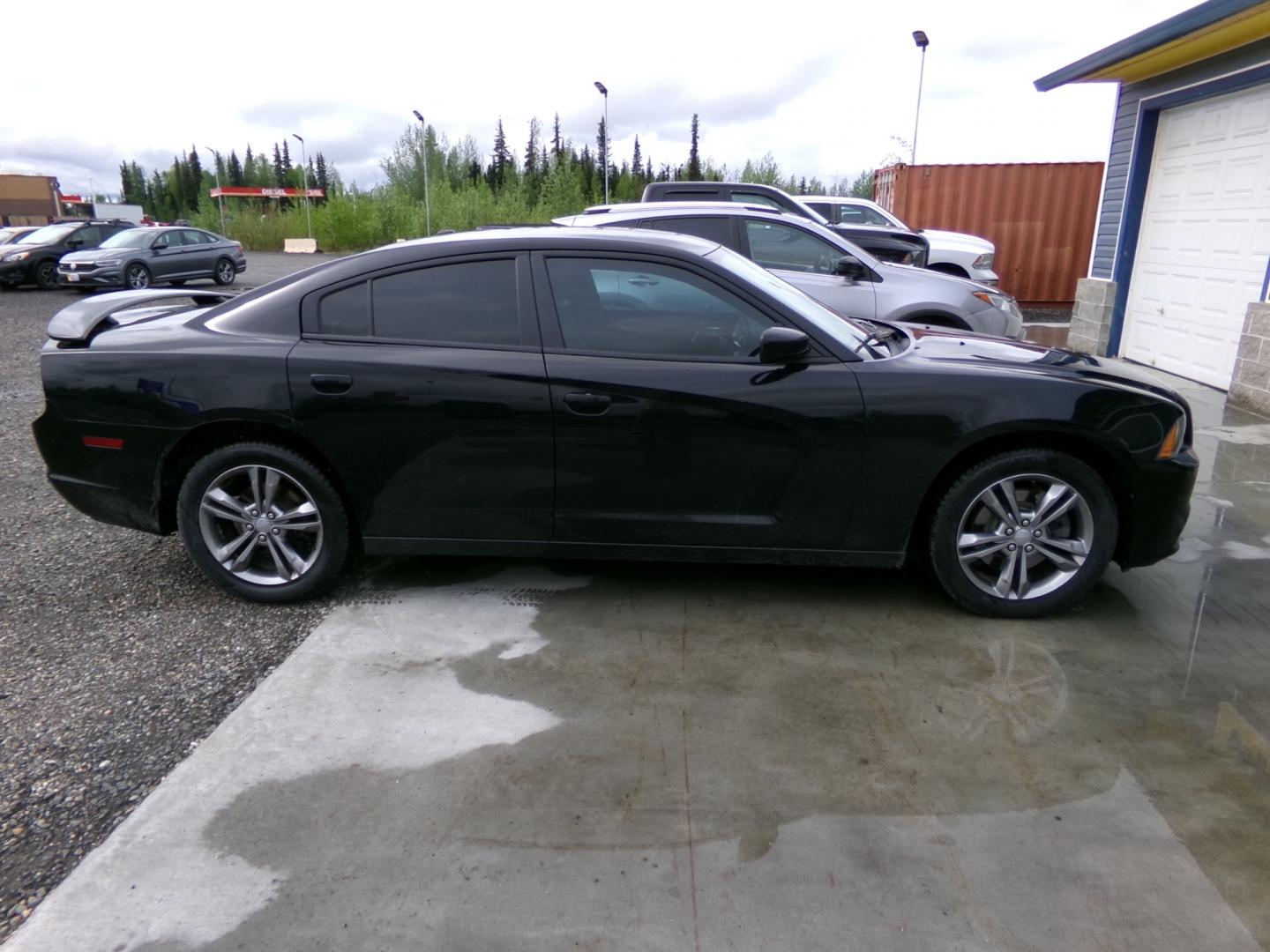 2014 Black Dodge Charger (2C3CDXJG7EH) , located at 2630 Philips Field Rd., Fairbanks, AK, 99709, (907) 458-0593, 64.848068, -147.780609 - Photo#2